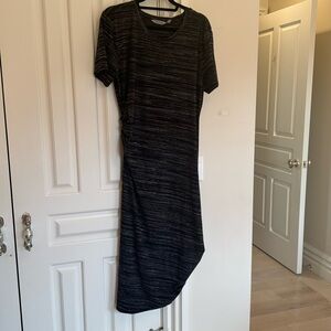 Athleta knit dress with touching on the side.
